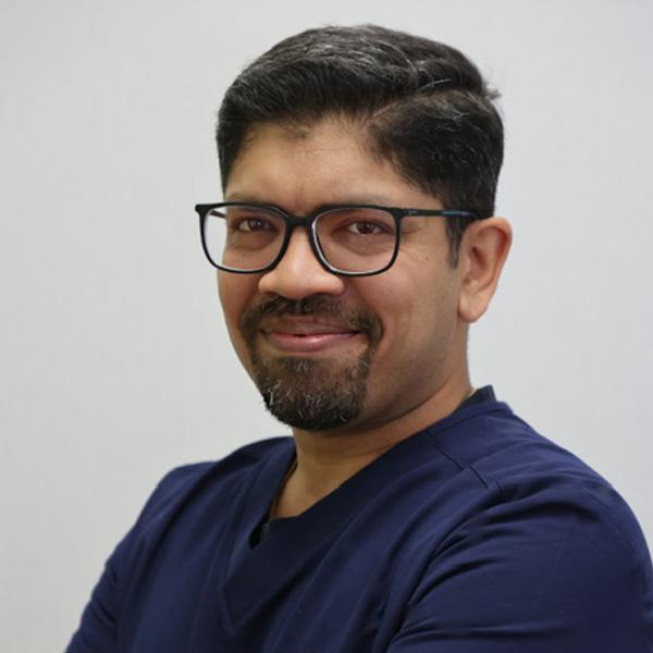 Dr. Anish John