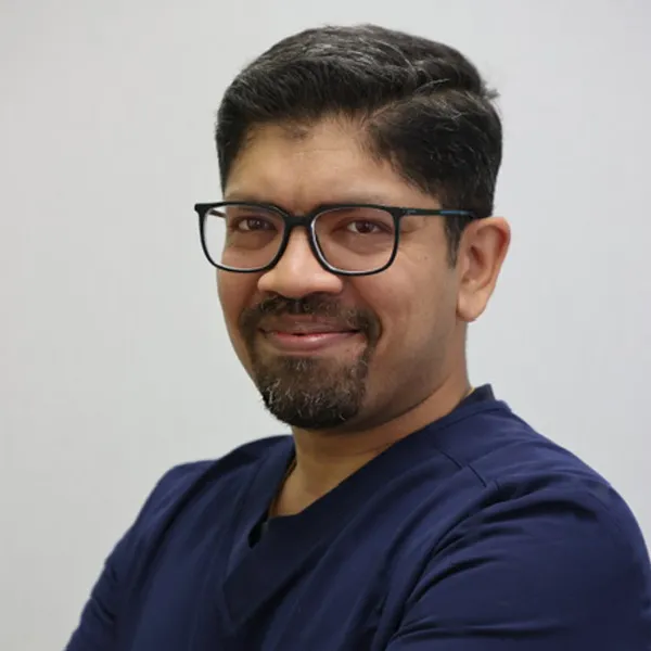Dr. Anish John